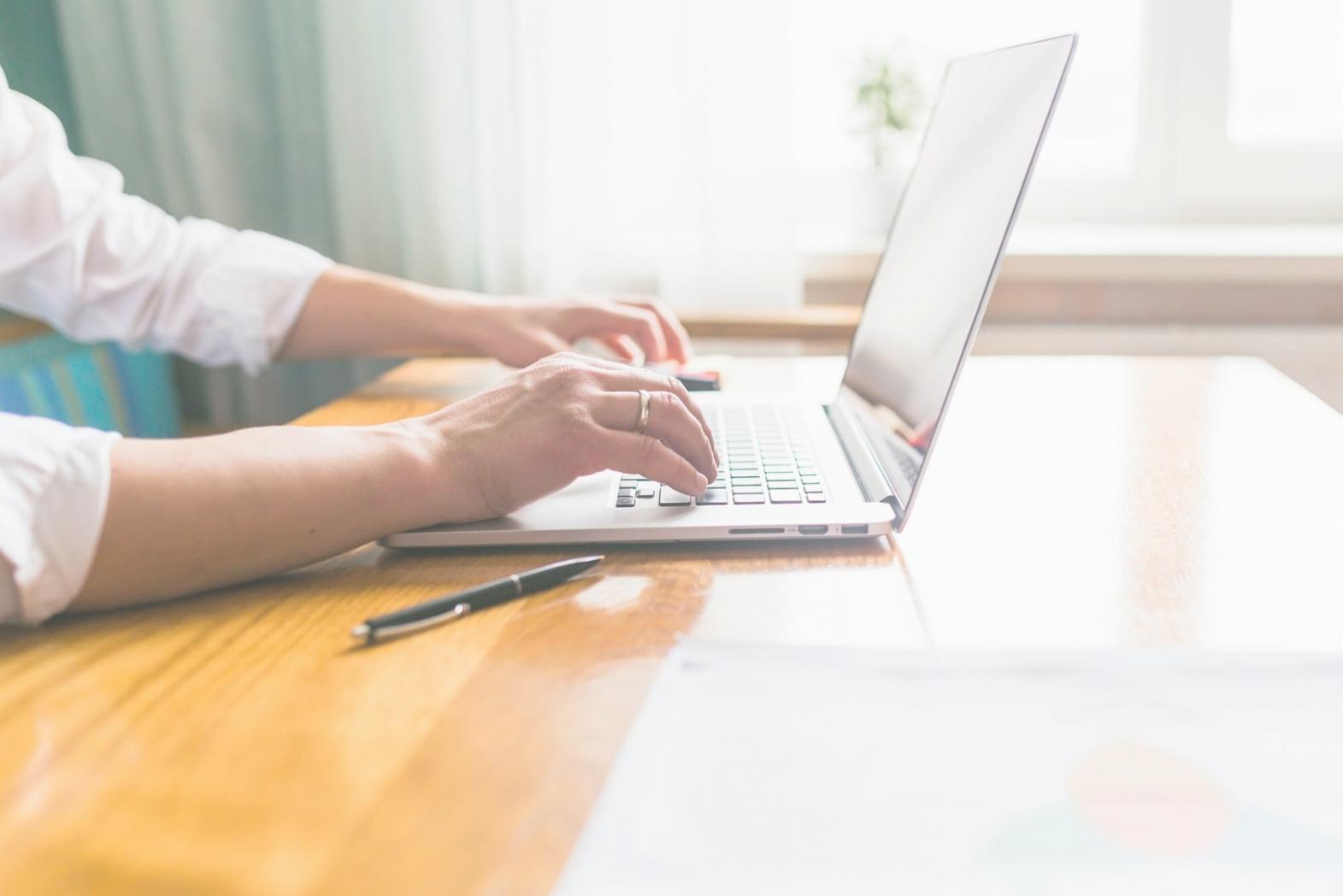 Financial planning discussion with business documents and charts