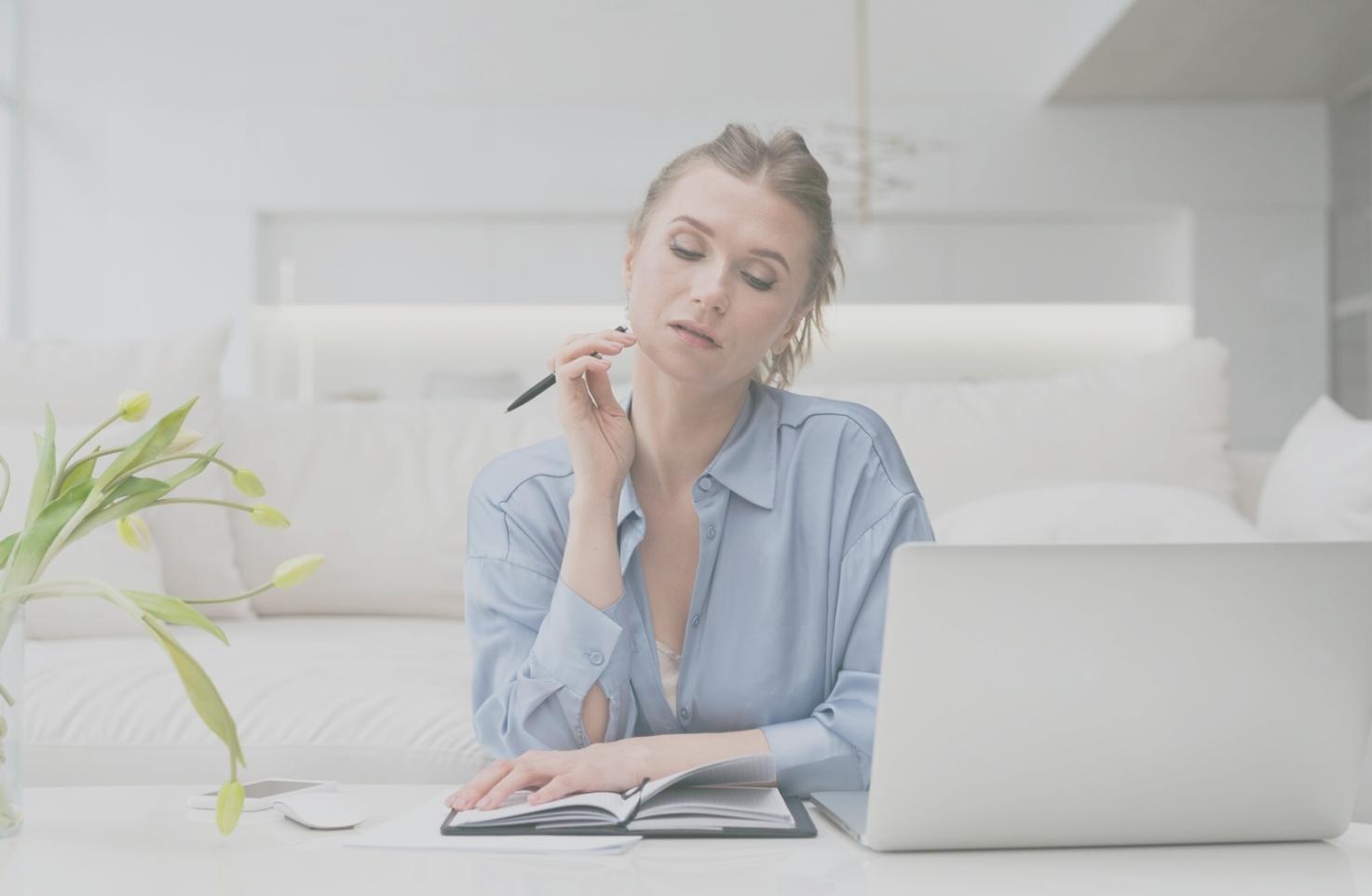 Business owner reviewing financial reports and making strategic decisions